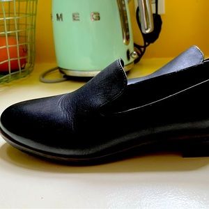 Clark’s black leather heeled shoes